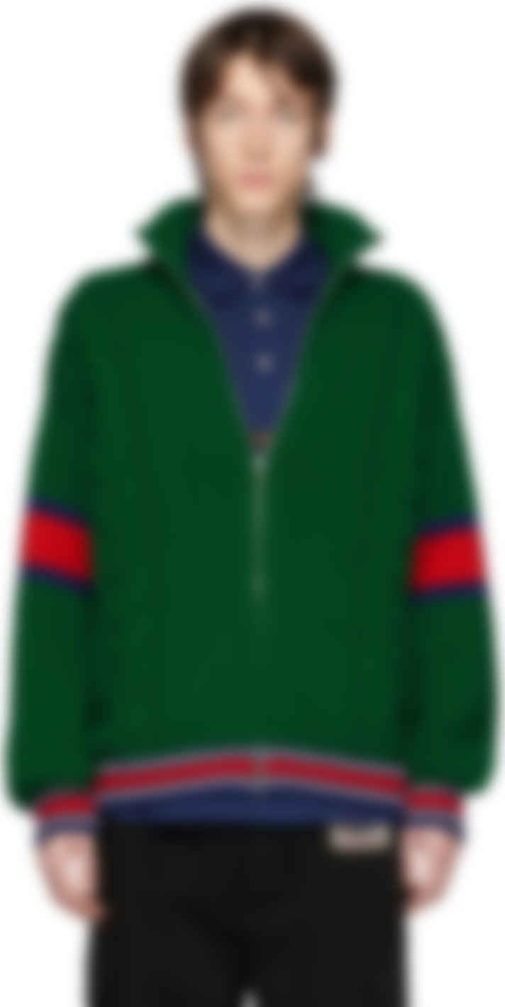 green zip up sweater