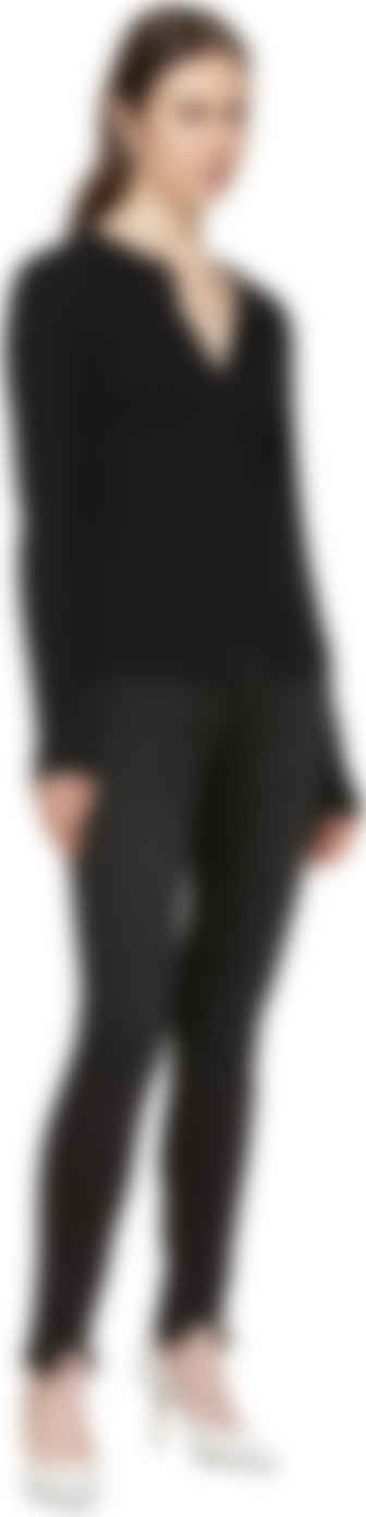 black chewed hem jeans