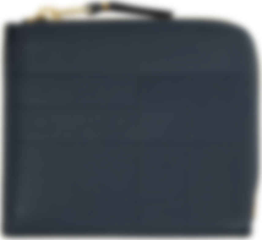 comme des garcons half zip wallet