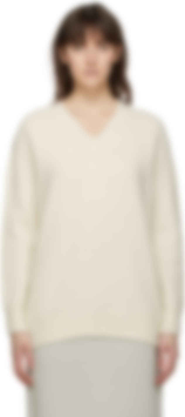 white alpaca sweater