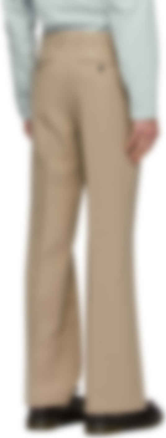 flared beige trousers