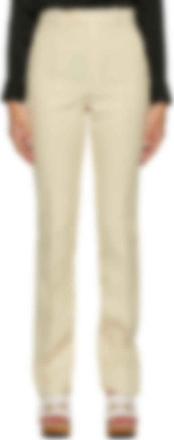beige flared trousers