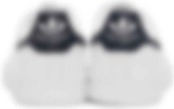 adidas originals stan smith sneakers in white and navy