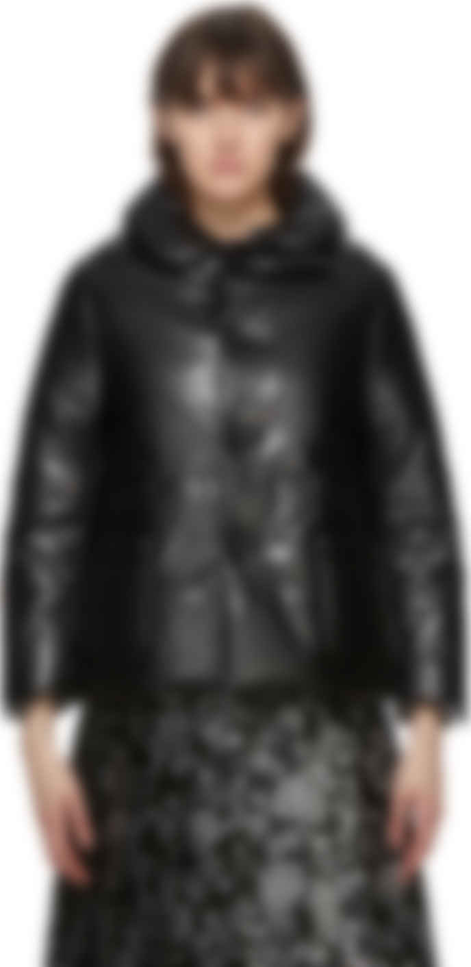 Tricot Comme Des Garconsのブラック フェイクレザー パファー ジャケットがセール中