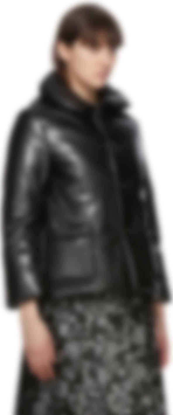 Tricot Comme Des Garconsのブラック フェイクレザー パファー ジャケットがセール中