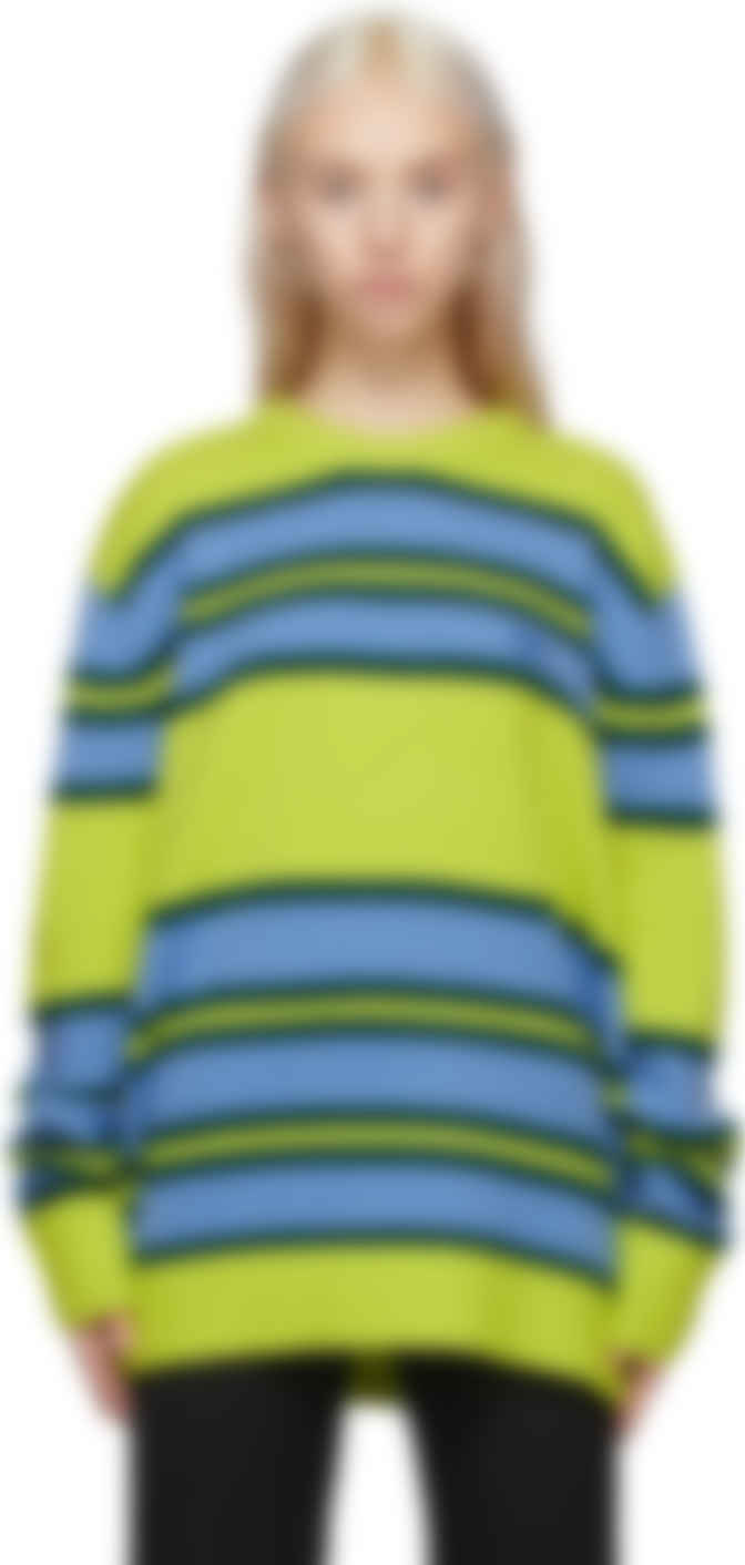 green sweater with yellow stripe