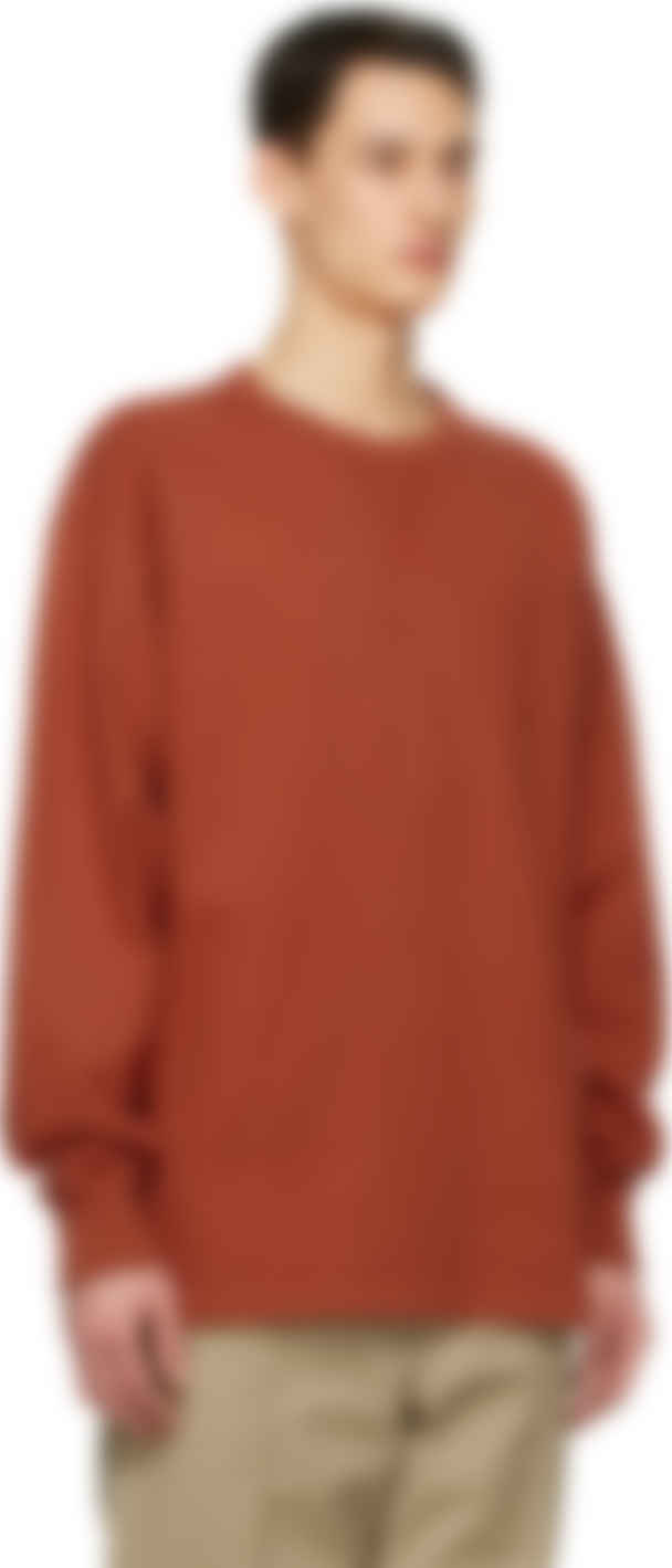 Acne Studiosのオレンジ ロゴ スウェットシャツがセール中
