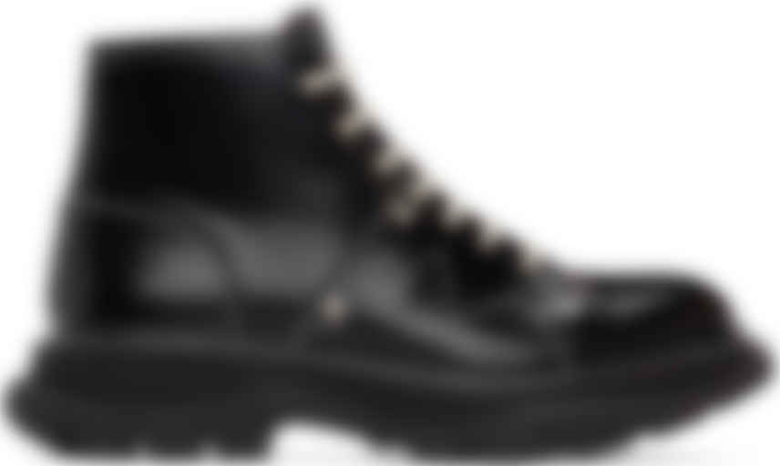 black boots white stitching