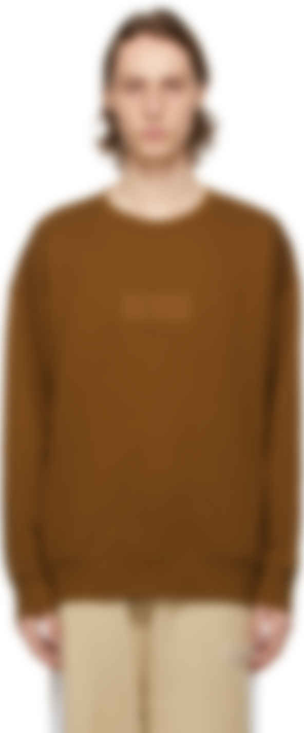brown puma shirt