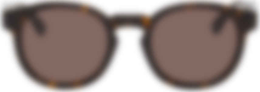 Gucci: Tortoiseshell GG0825S Sunglasses 