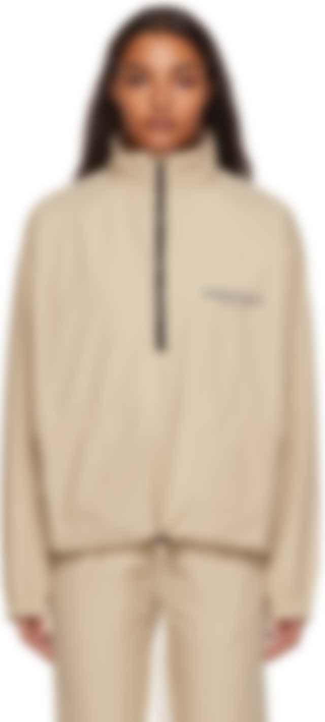 beige track jacket