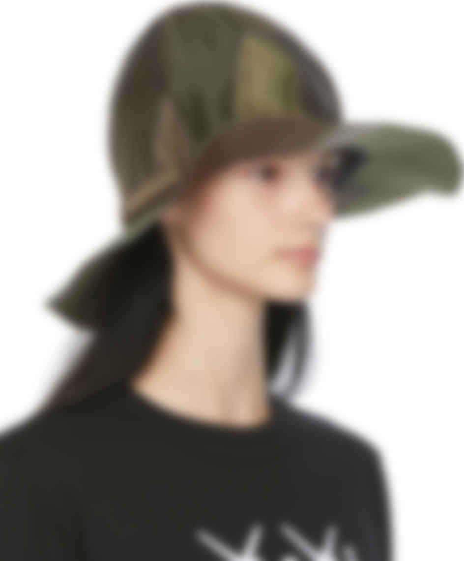sacai: Green KAWS Edition Camo Mountain Metro Hat | SSENSE UK
