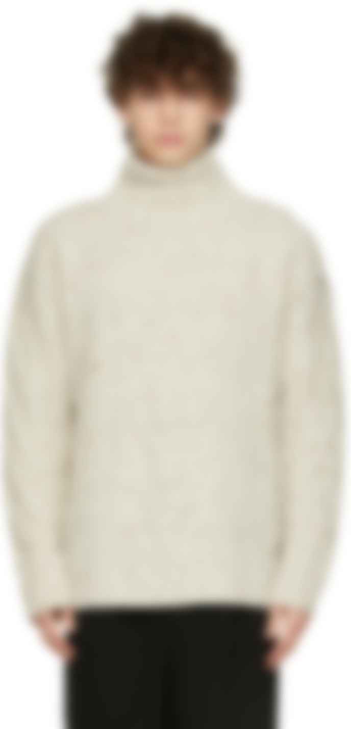 white cable knit turtleneck
