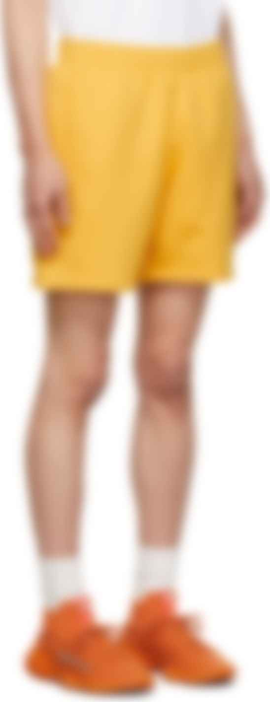 adidas x Humanrace by Pharrell Williams: Short jaune en coton Humanrace  Basics exclusif à SSENSE France | SSENSE