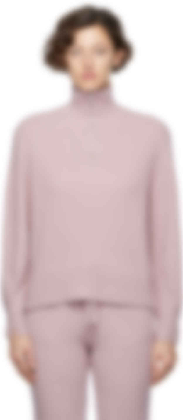 pink half zip sweater