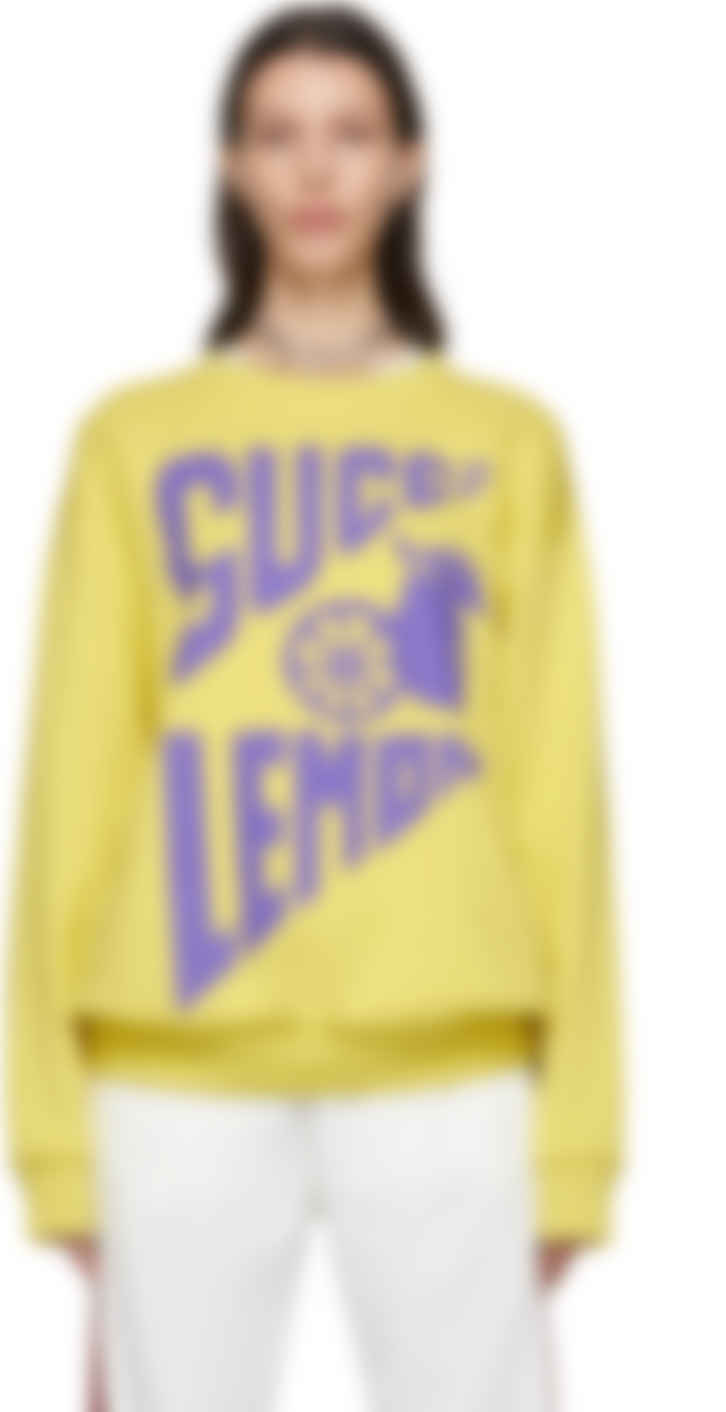 yellow crewneck sweatshirt