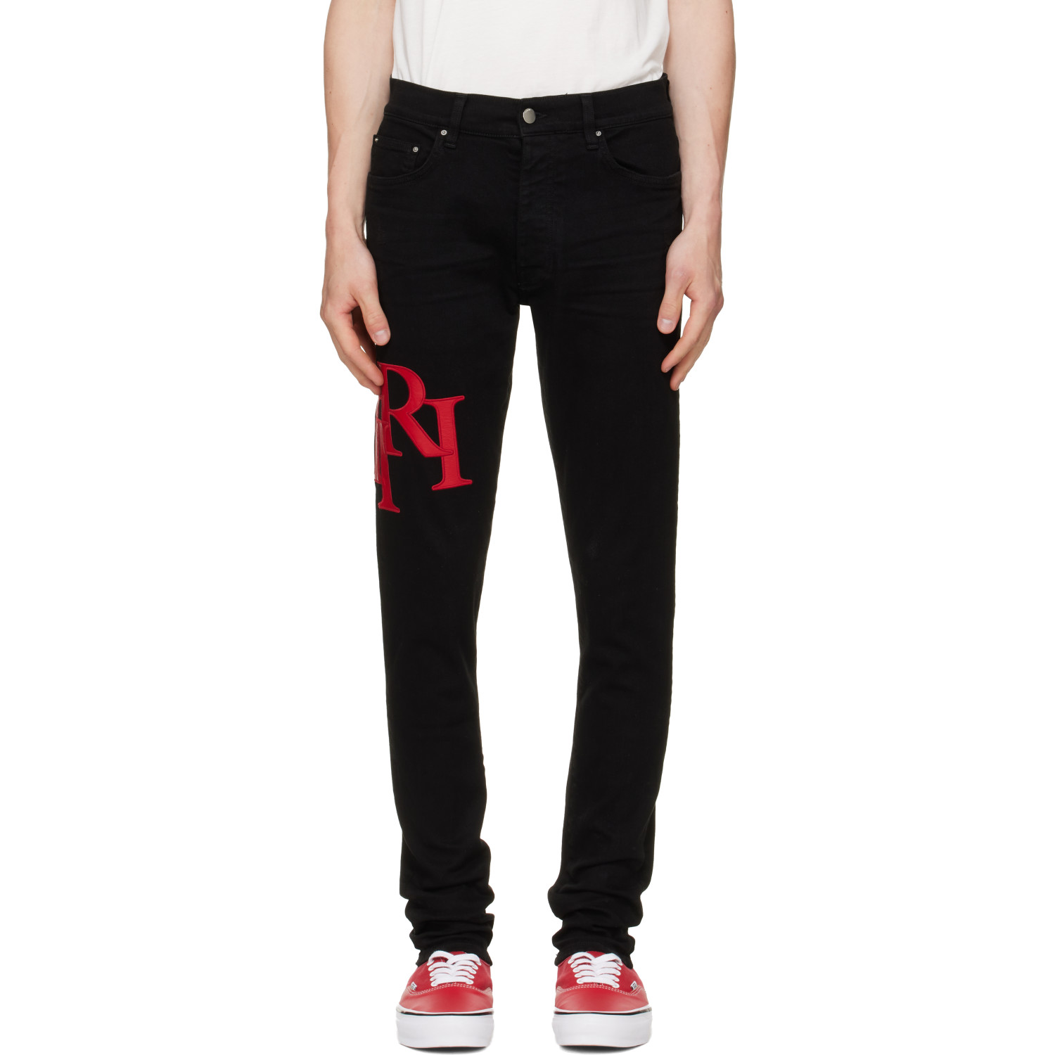 AMIRI Black Staggered Logo Skinny Jeans