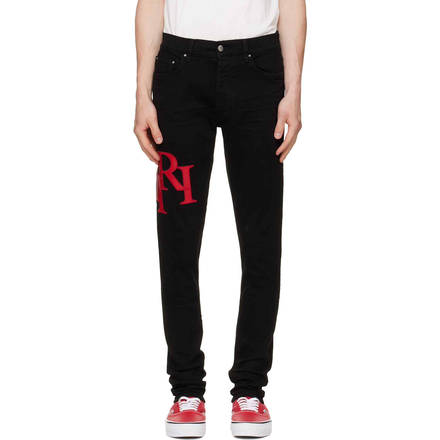 AMIRI Black Staggered Logo Skinny Jeans