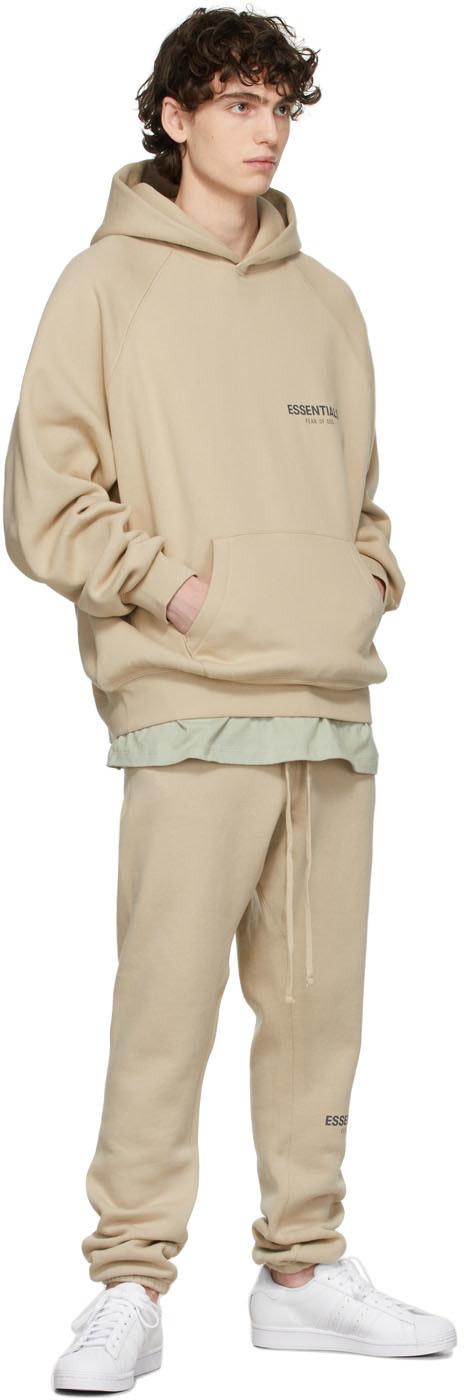 Fear of God ESSENTIALS - Pull à capuche beige en coton exclusif à SSENSE