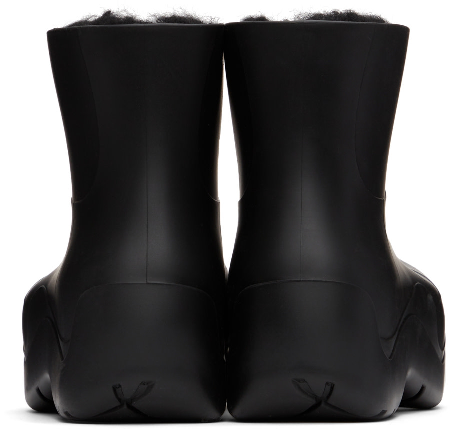 Bottega Veneta: Black Shearling Puddle Boots | SSENSE