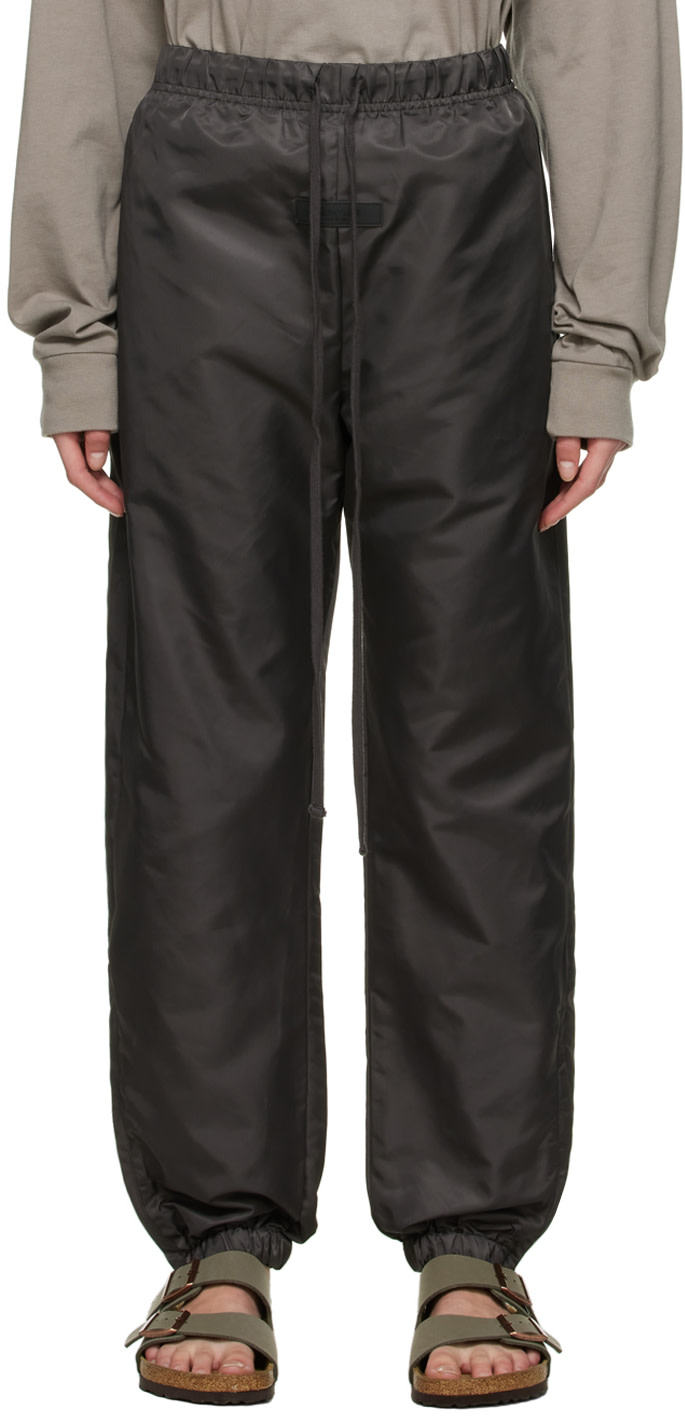 Fear of God ESSENTIALS: Black Nylon Track Pants | SSENSE Canada