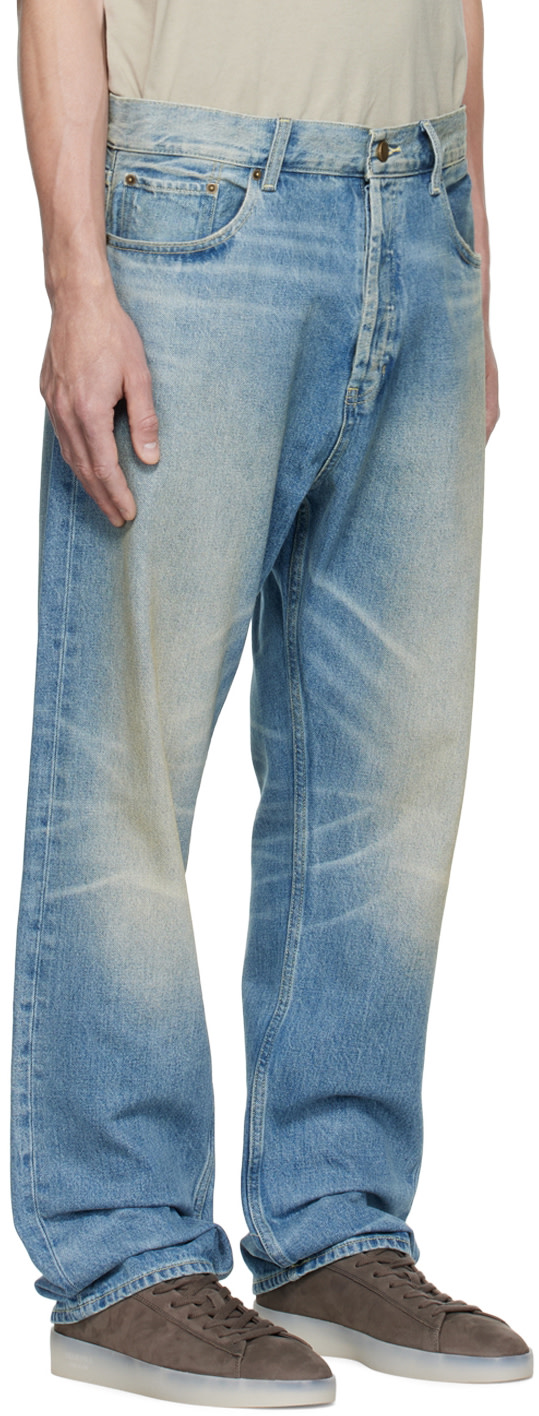 Fear of God ESSENTIALS - Jean bleu à effet délavé