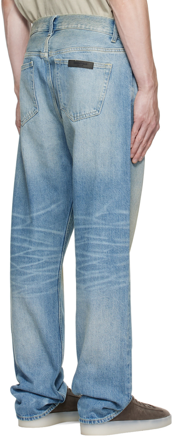 Fear of God ESSENTIALS - Jean bleu à effet délavé