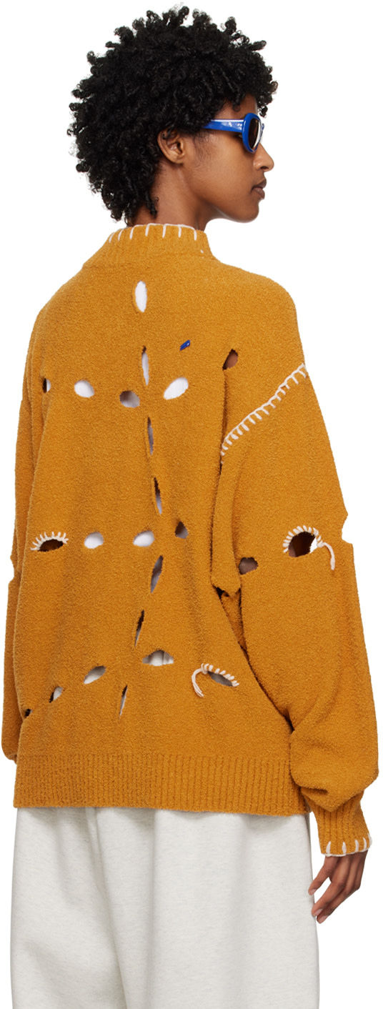 ADER error - Pull jaune à perforations