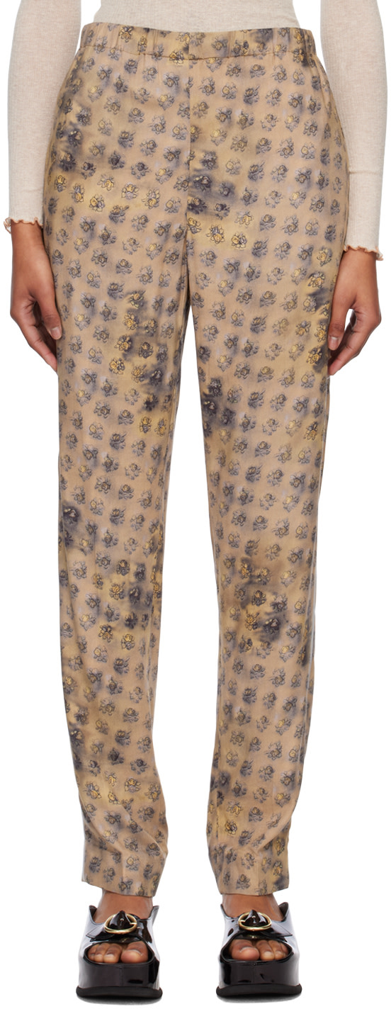 Acne Studios - Pantalon beige à motif fleuri