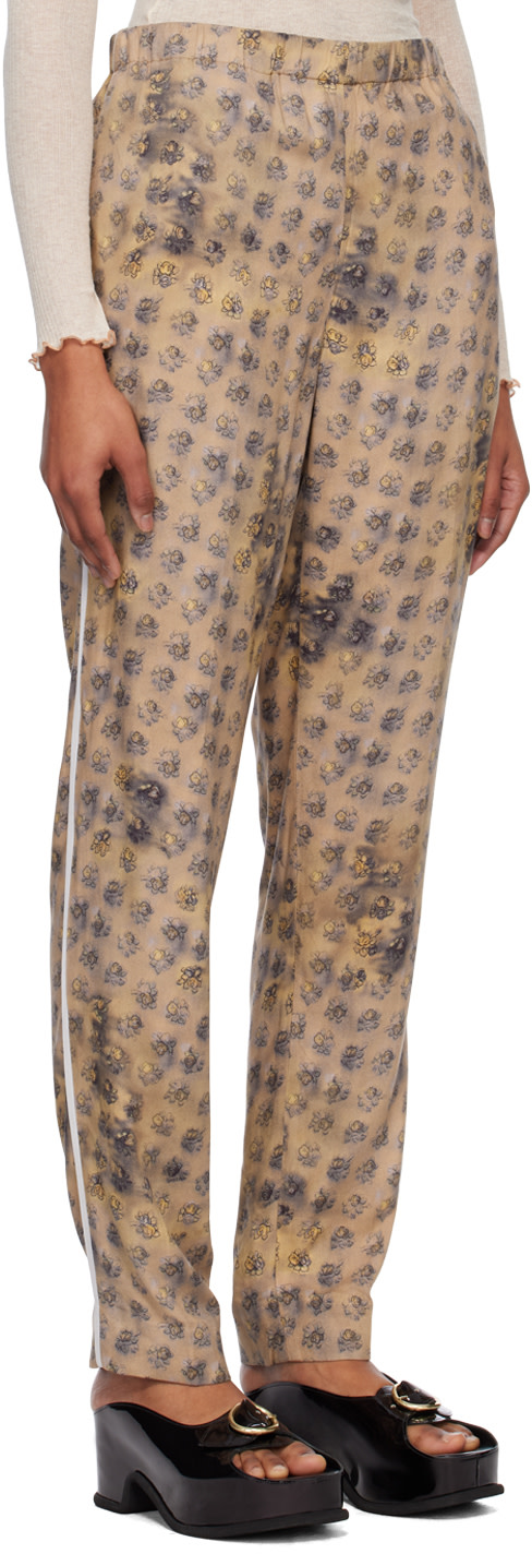 Acne Studios - Pantalon beige à motif fleuri