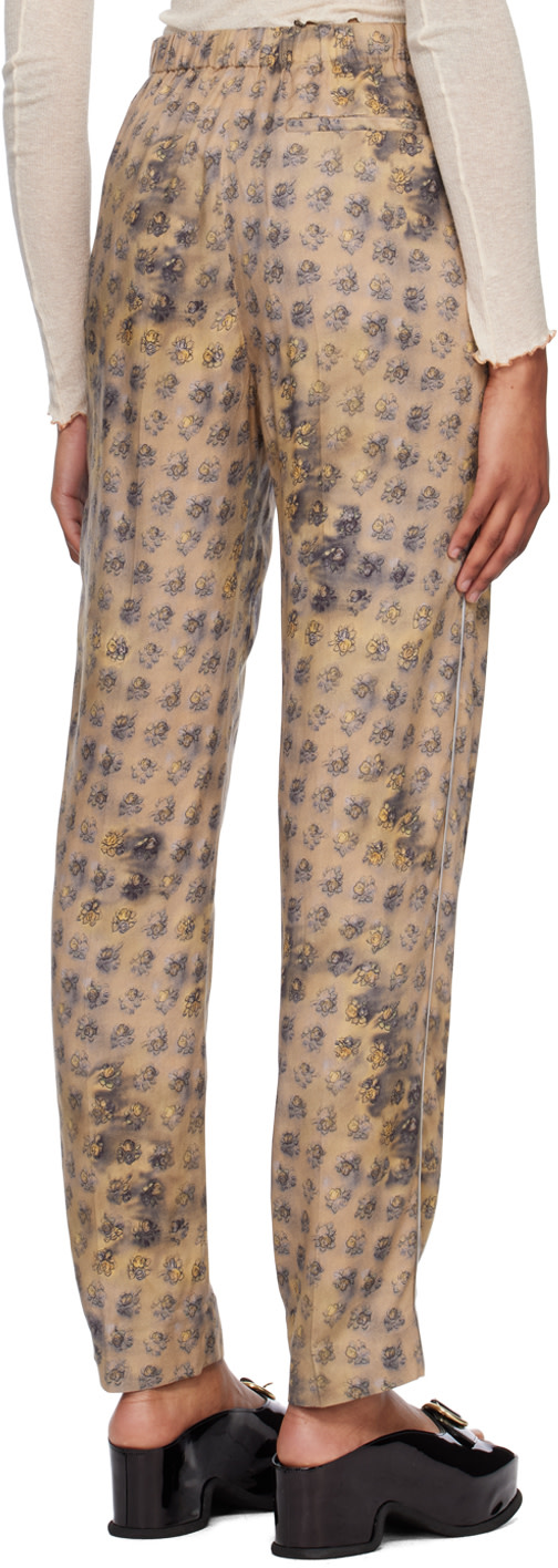 Acne Studios - Pantalon beige à motif fleuri