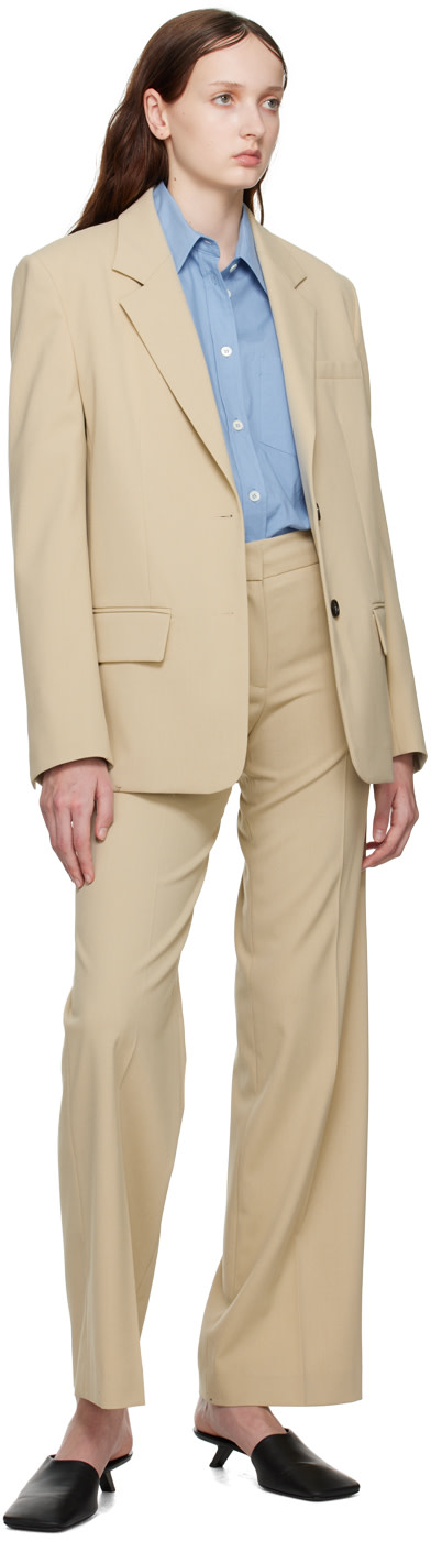 System - Pantalon beige à plis