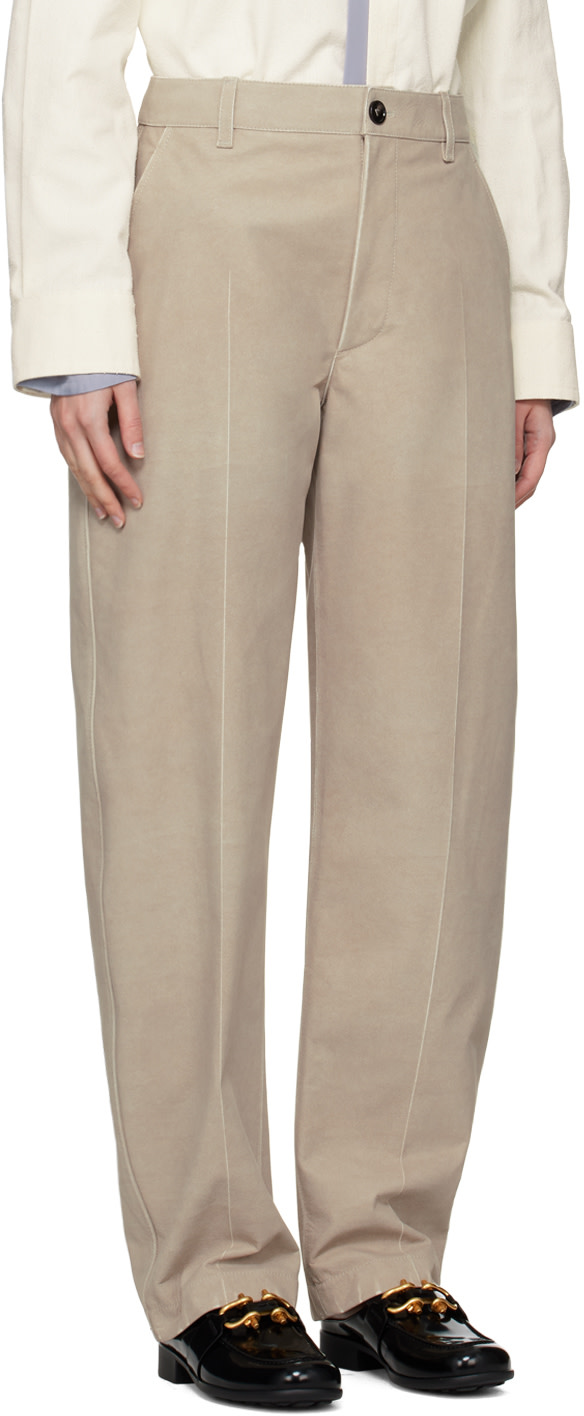 Bottega Veneta: Beige Printed Leather Pants | SSENSE