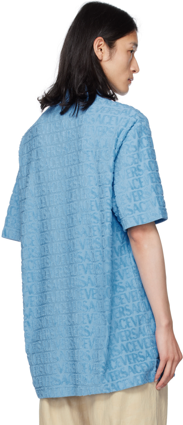 Versace - Polo bleu à motif à logos