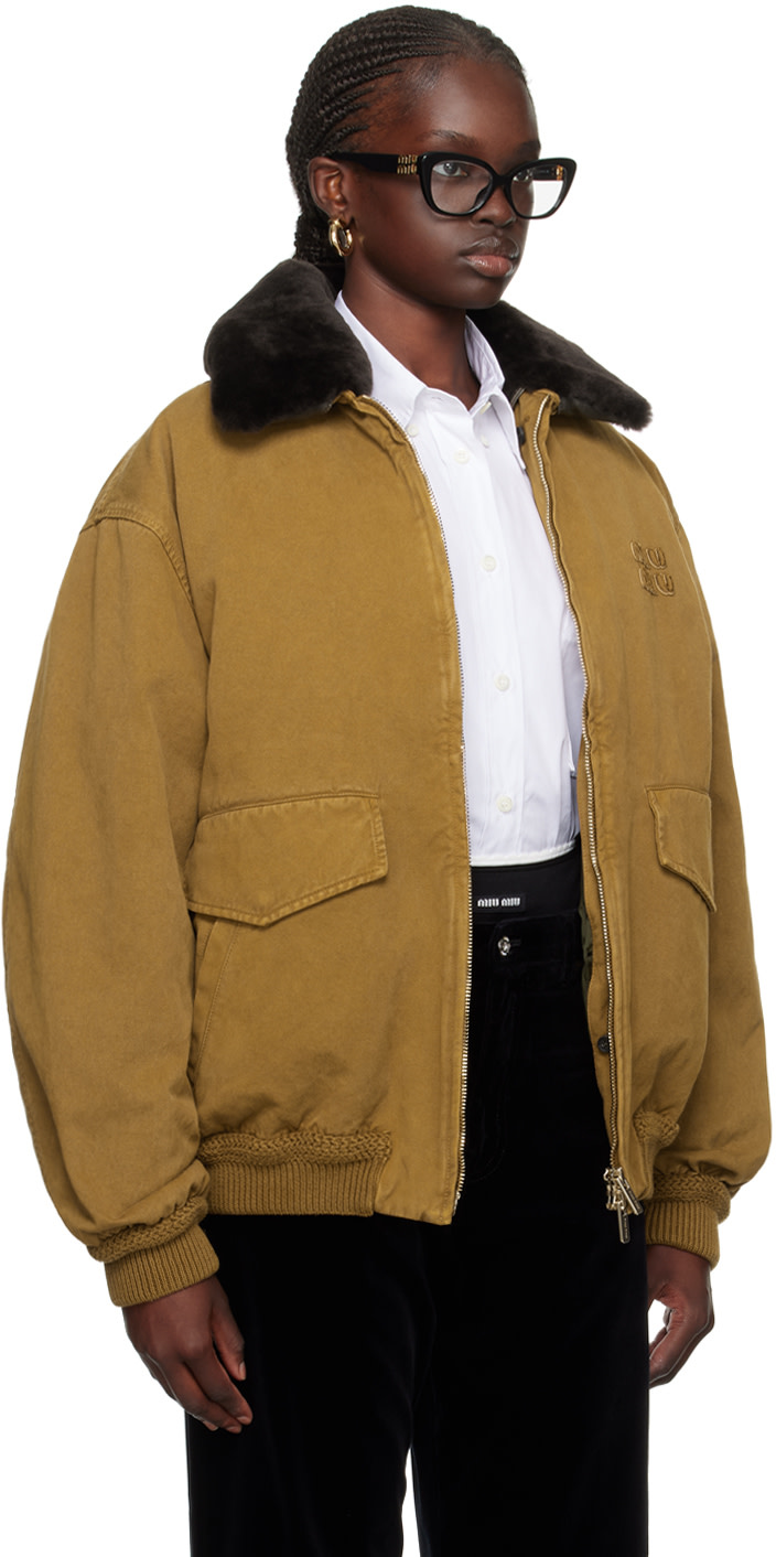 Miu Miu: Tan Oversized Down Jacket | SSENSE Canada