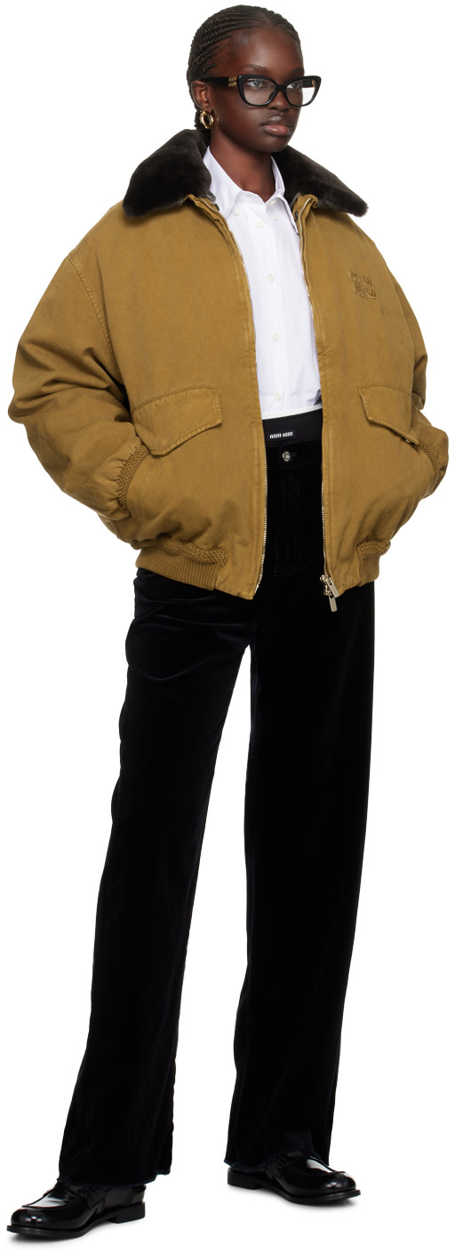 Miu Miu: Tan Oversized Down Jacket | SSENSE Canada