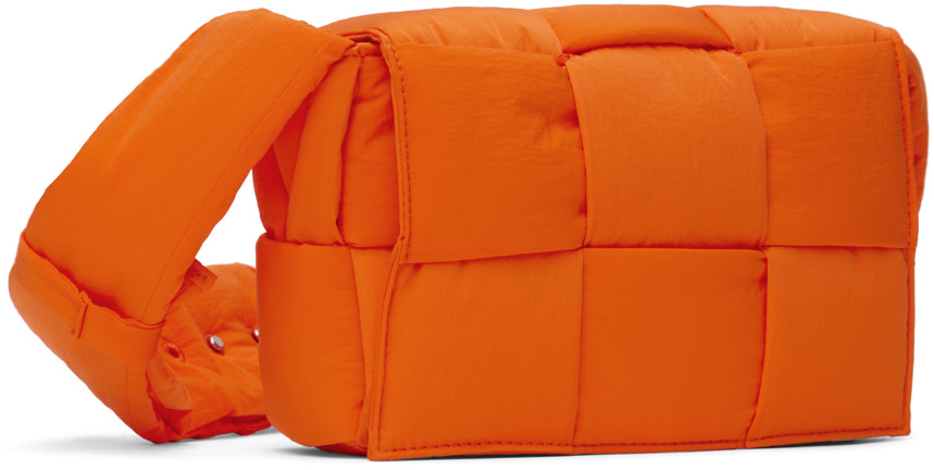 Bottega Veneta: Orange Small Padded Tech Cassette Bag | SSENSE