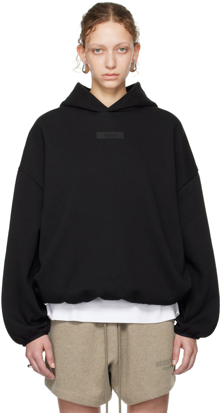 Fear of God ESSENTIALS - Pull à capuche noir à ourlet et poignets élastiques - Core