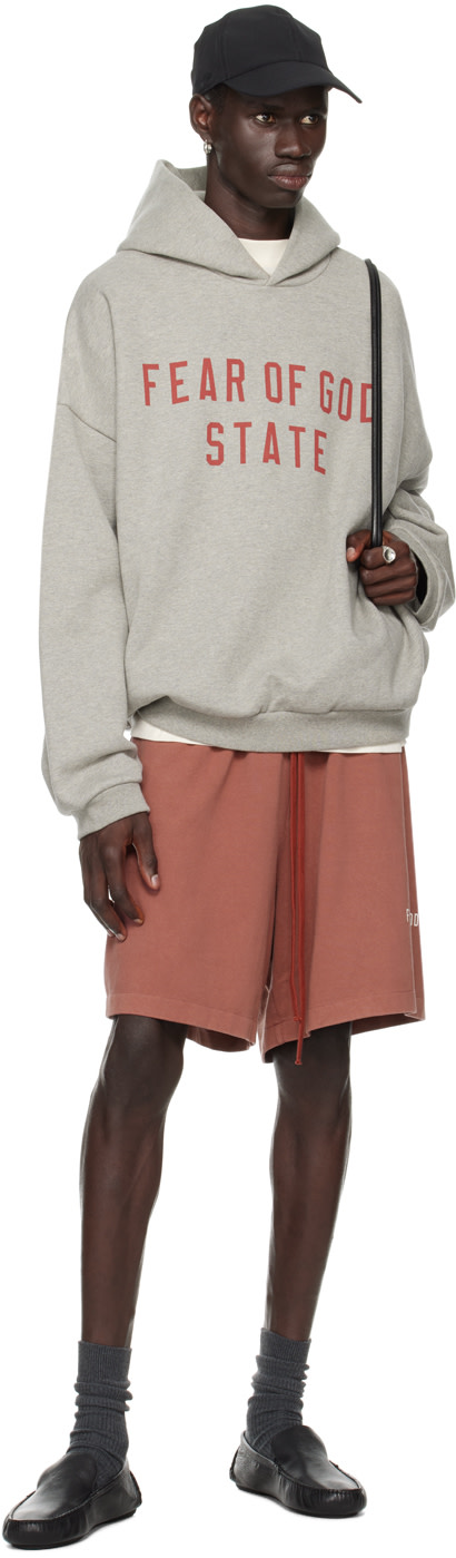 Fear of God ESSENTIALS - Pull à capuche gris à logo imprimé