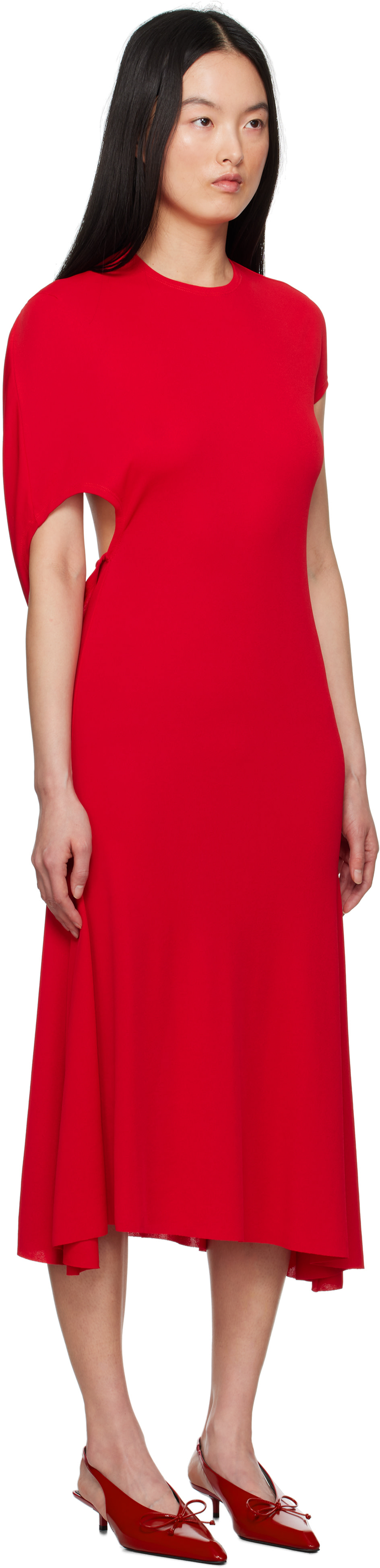 jacquemus red dress Kylie Jenner Wore a Minidress With Shoulder Pads Features a draped high neckline Jacquemus - The Regata Dress