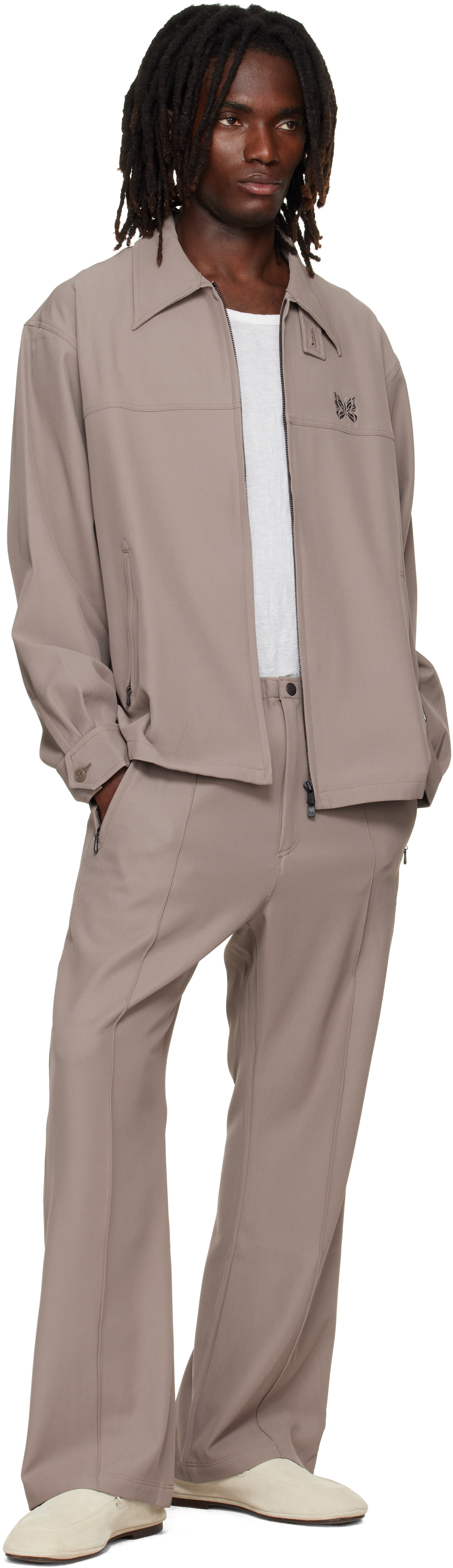 NEEDLES: Taupe Cavalry Twill Boot-Cut Warm Up Trousers | SSENSE
