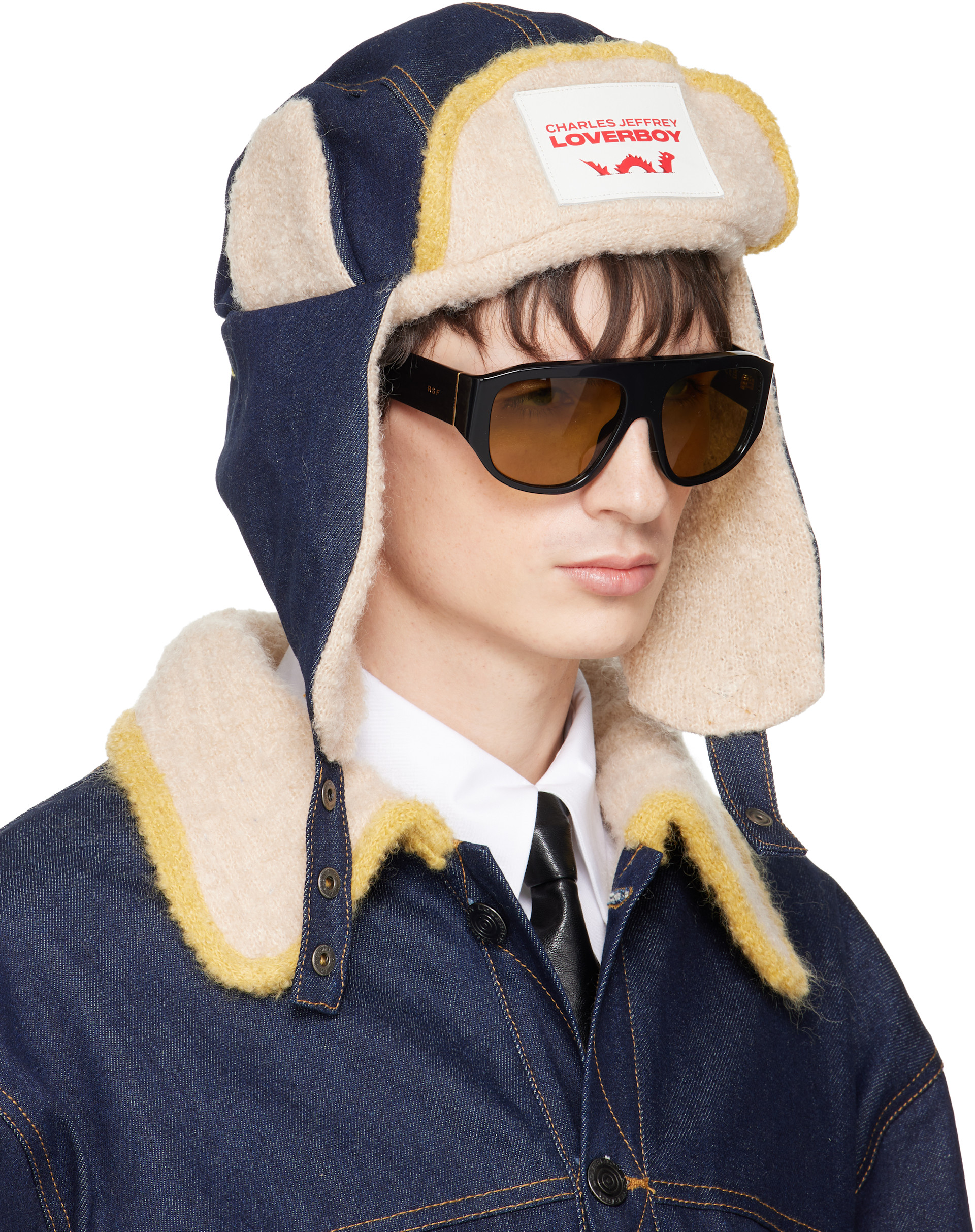 帽子 CHARLES JEFFREY LOVERBOY Charles Jeffrey LOVERBOY: Navy & Beige Knit Patch Trapper Hat | SSENSE