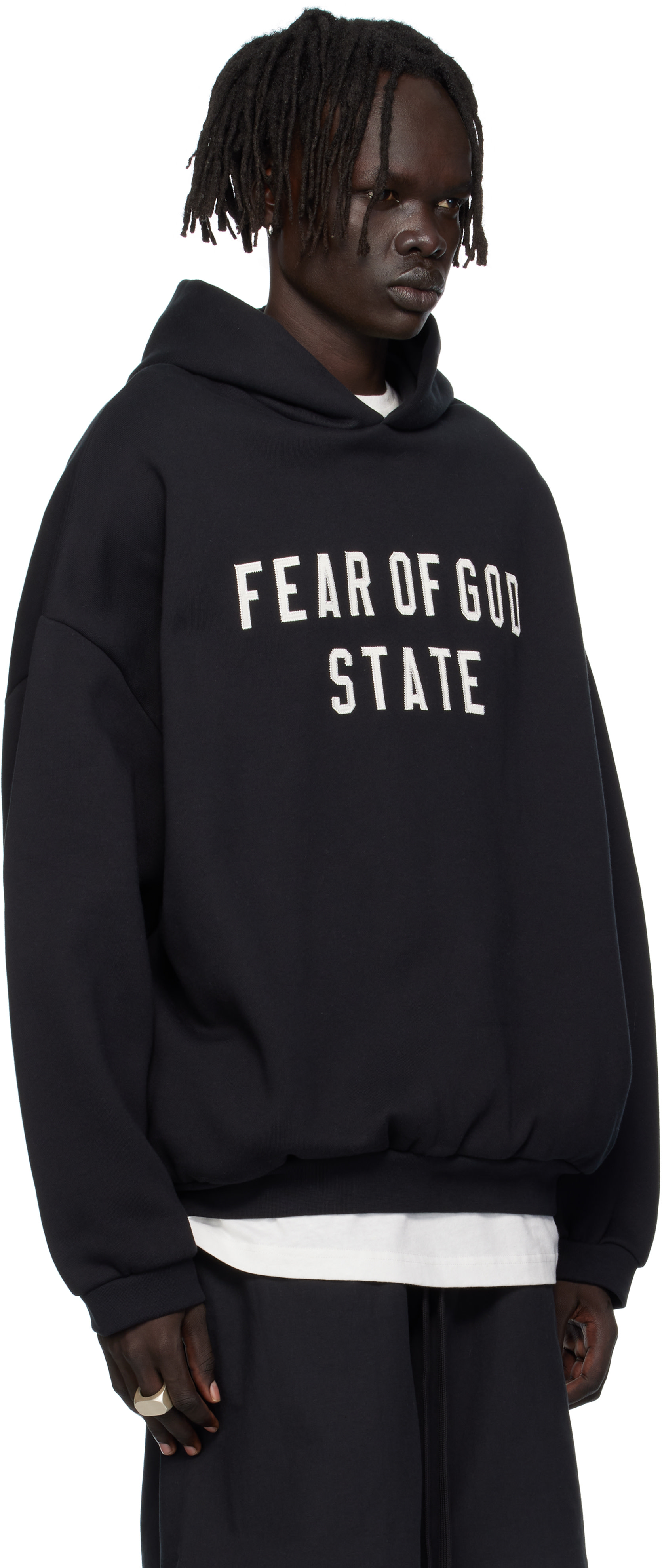 Fear of God ESSENTIALS: Black 90s Fit Fleece Hoodie | SSENSE