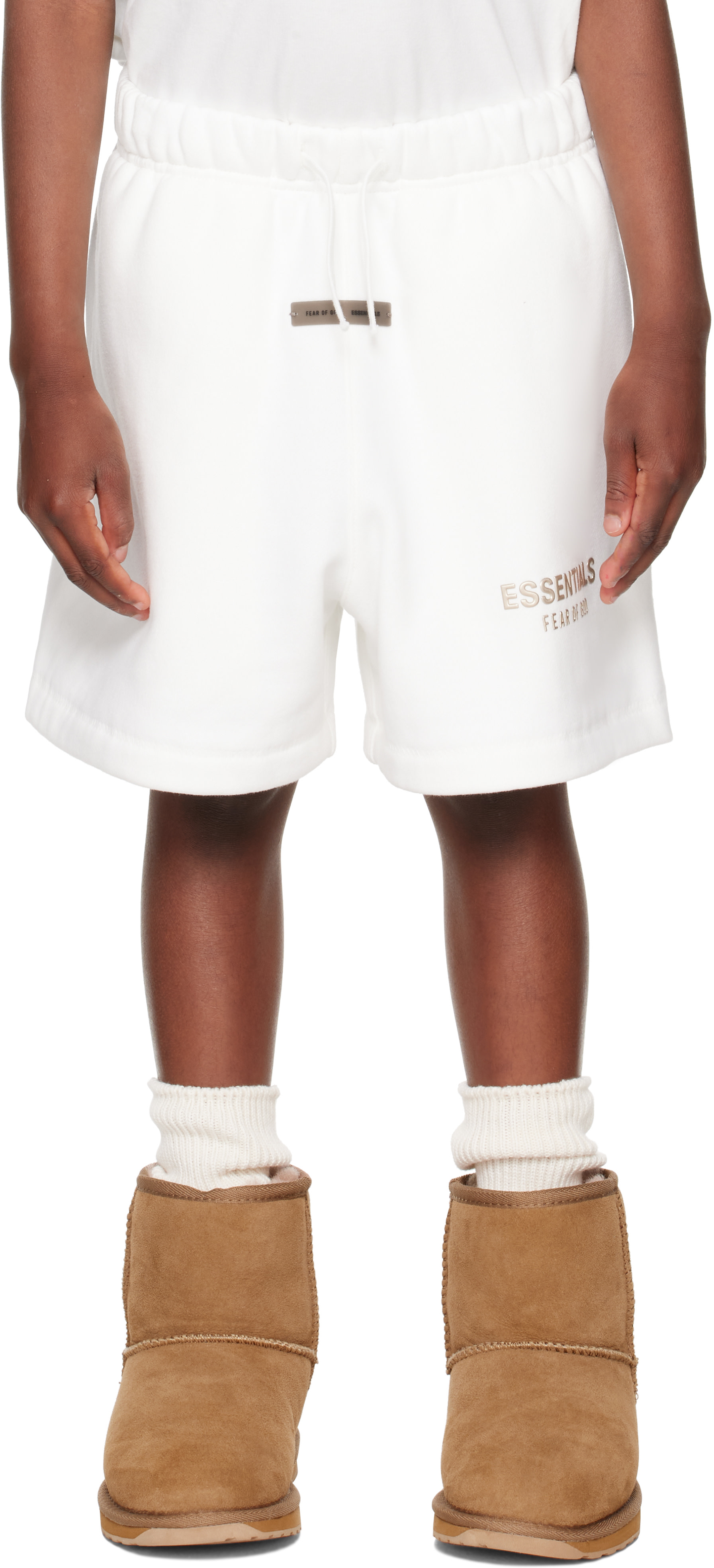 Fear of God ESSENTIALS: Kids White Fleece Soccer Shorts | SSENSE China