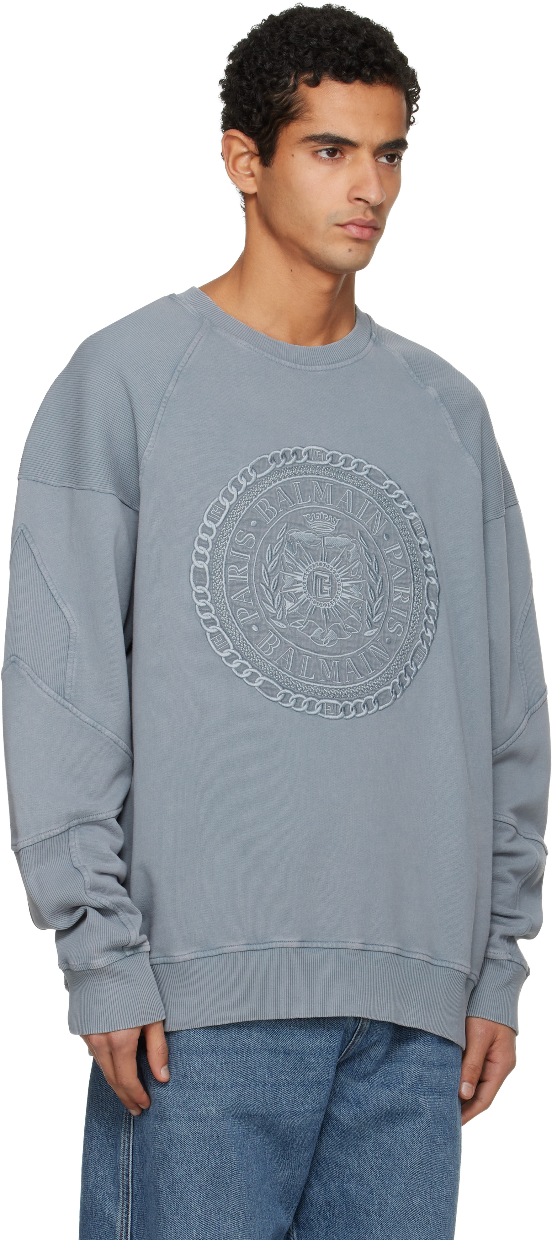 Balmain - Pull molletonné gris à broderie Balmain Médaille