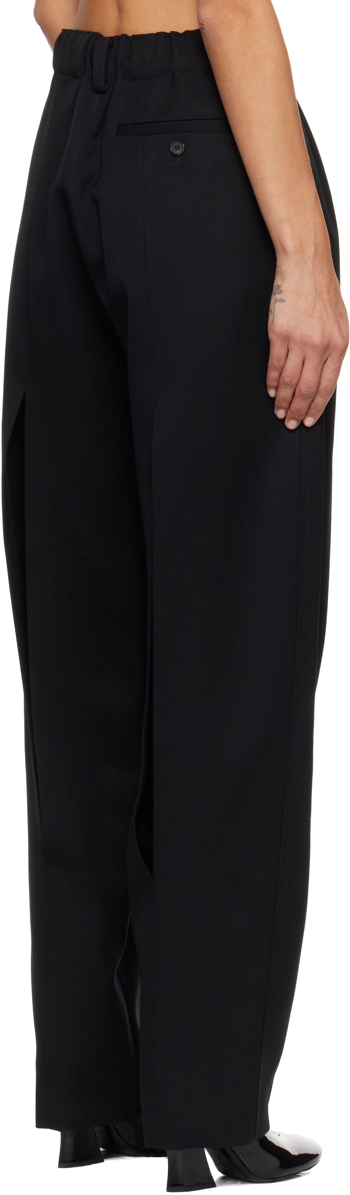 Givenchy - Pantalon noir à plis et à découpes