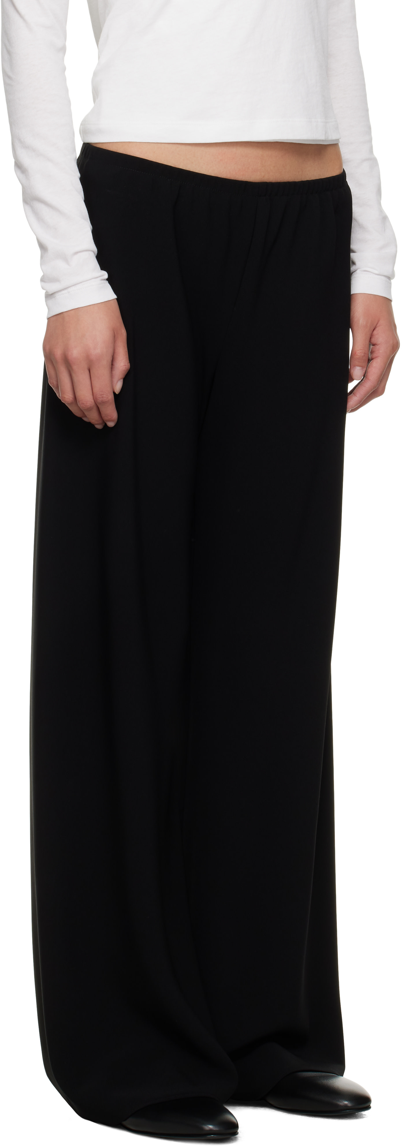 The Row: Black Gala Trousers | SSENSE