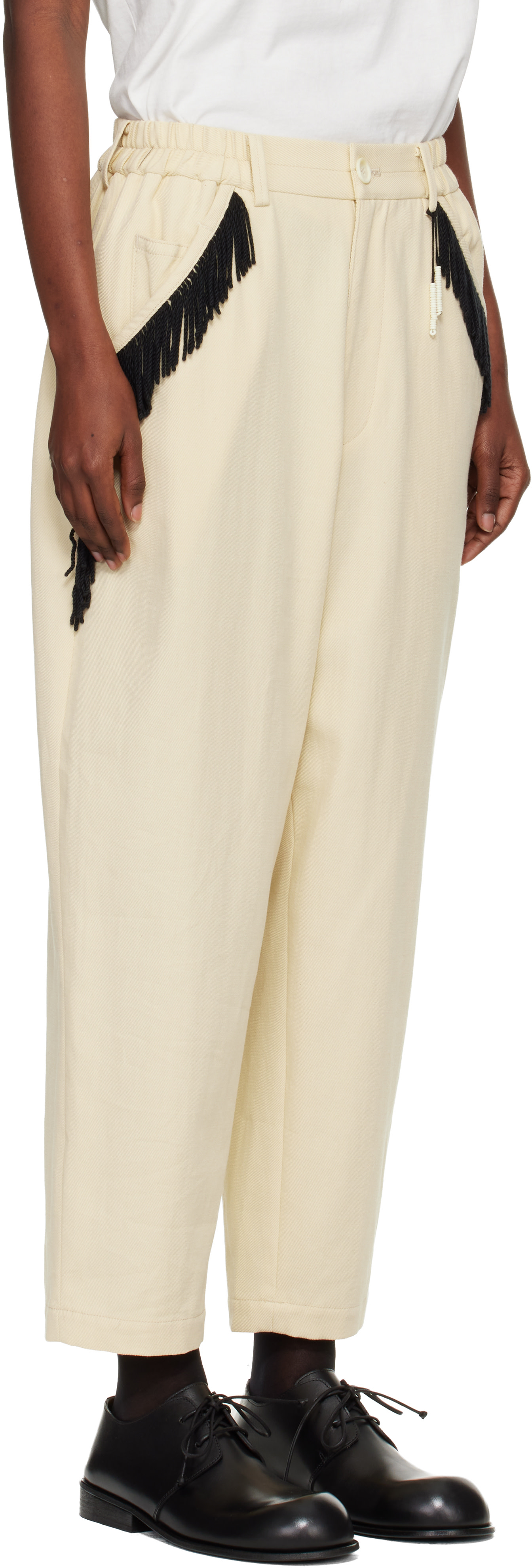 UNDERCOVER - Pantalon beige à franges