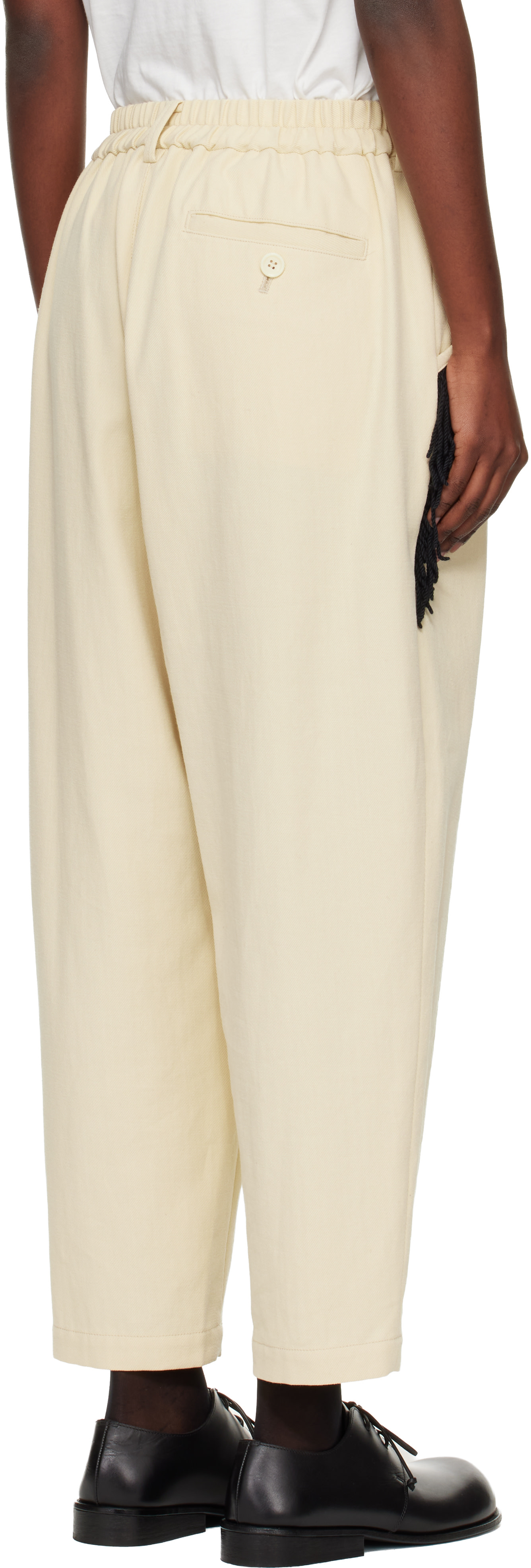 UNDERCOVER - Pantalon beige à franges