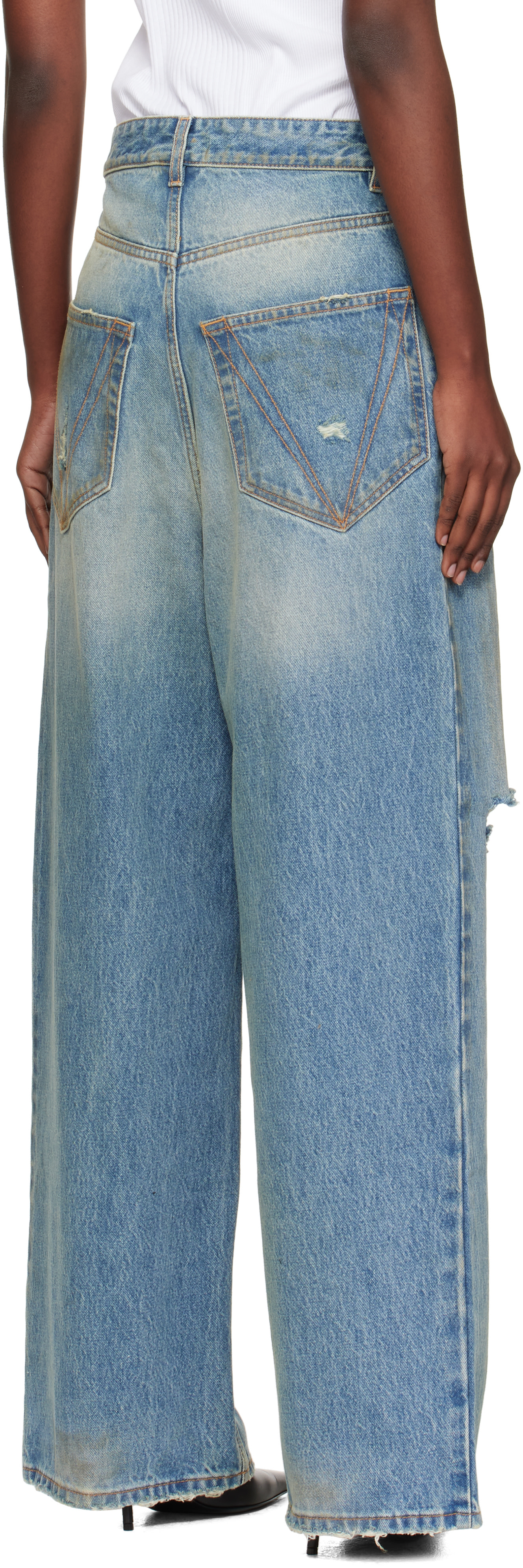 VETEMENTS - Jean ample bleu à effet usé